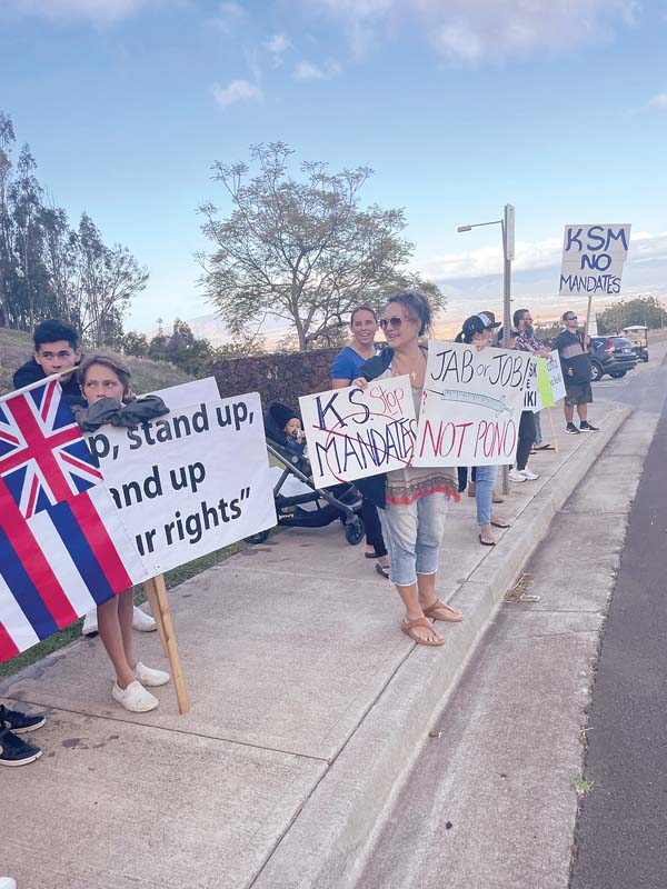 Contact tracing device plans at Maui school spur protests - Maui News